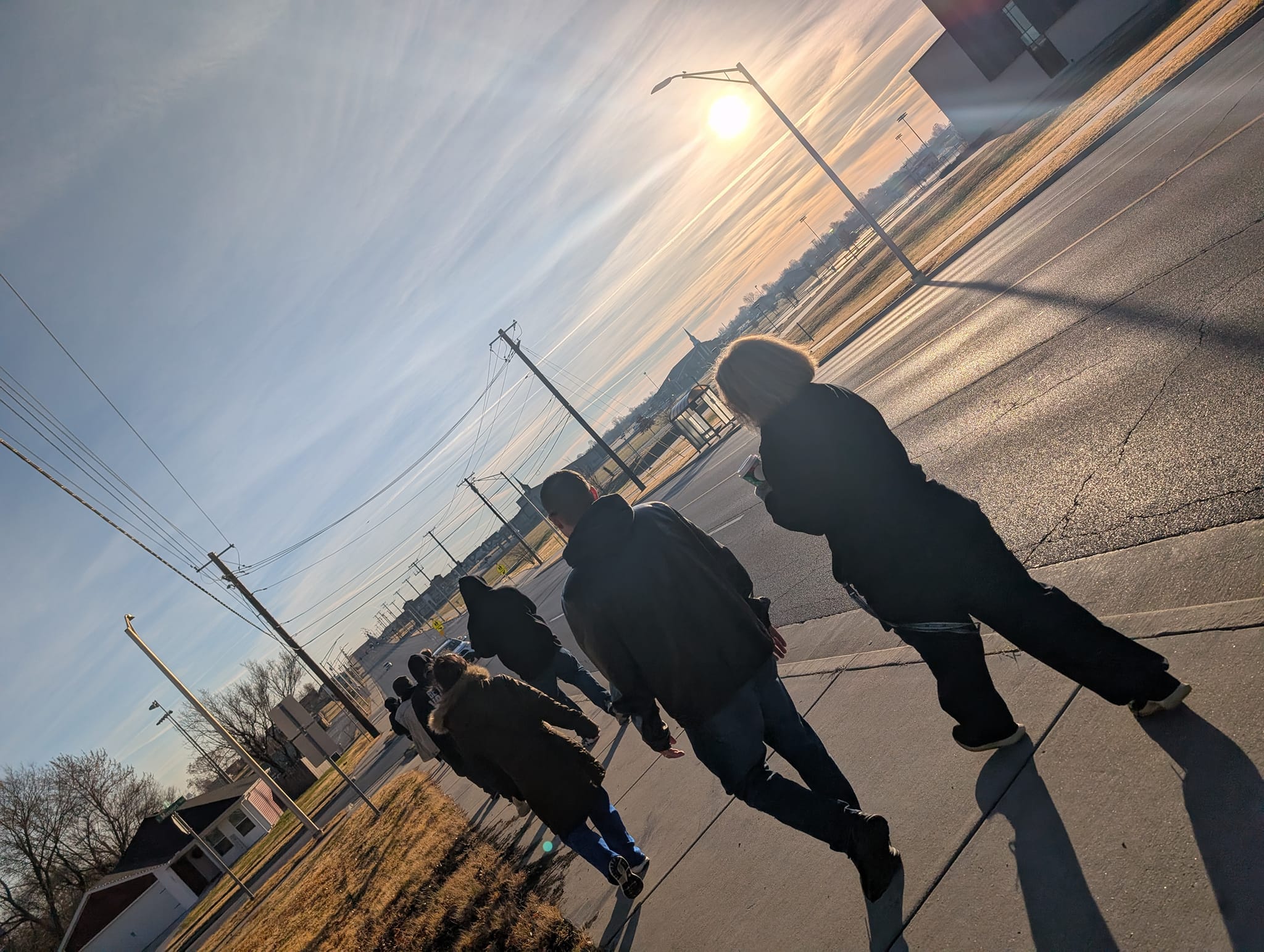 People walking together on a road