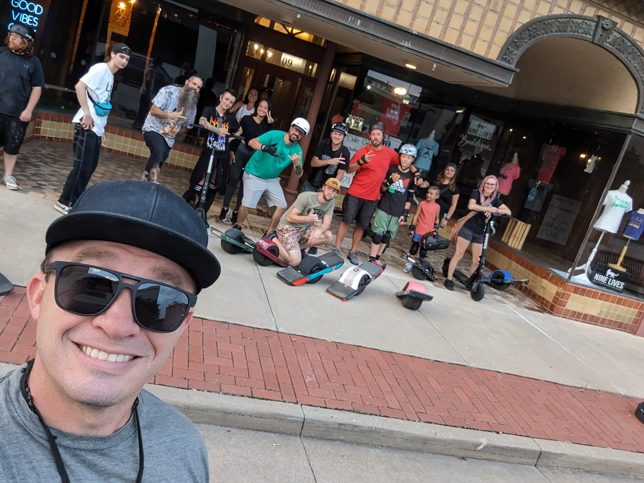 Jon Thomas Buck with a local movement group outside a Joplin storefront